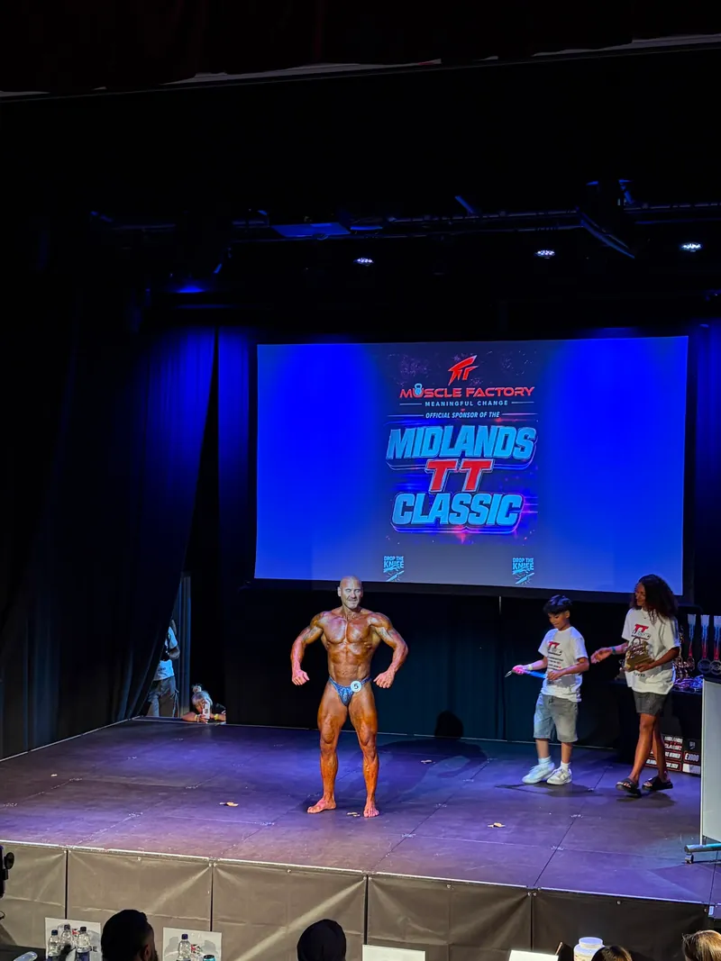 Gold medal won by Tom at a bodybuilding show
